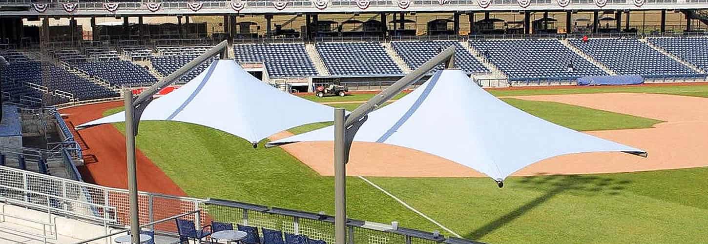 a shade structure for a baseball field