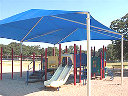 Playground shades :: Right-side view of the same play structure under the playground shade structure and canopy.