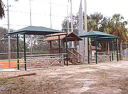 Playground shades :: These shade structures and canopies cover the bleachers at a local baseball field.