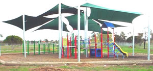 playground shades, shade structures, playground shade structures, play area shade, playarea shade, playarea sunshade, play area sunshade, sunshade, playground sunshade, canopy, playground canopy, play shades, playground sunblock, overhead shades, umbrella post shade, sail shades, sailshades, sail shade structures