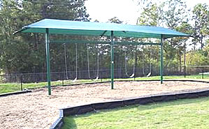 Playground shades and canopies built into a swingset protect from the sun and look great.